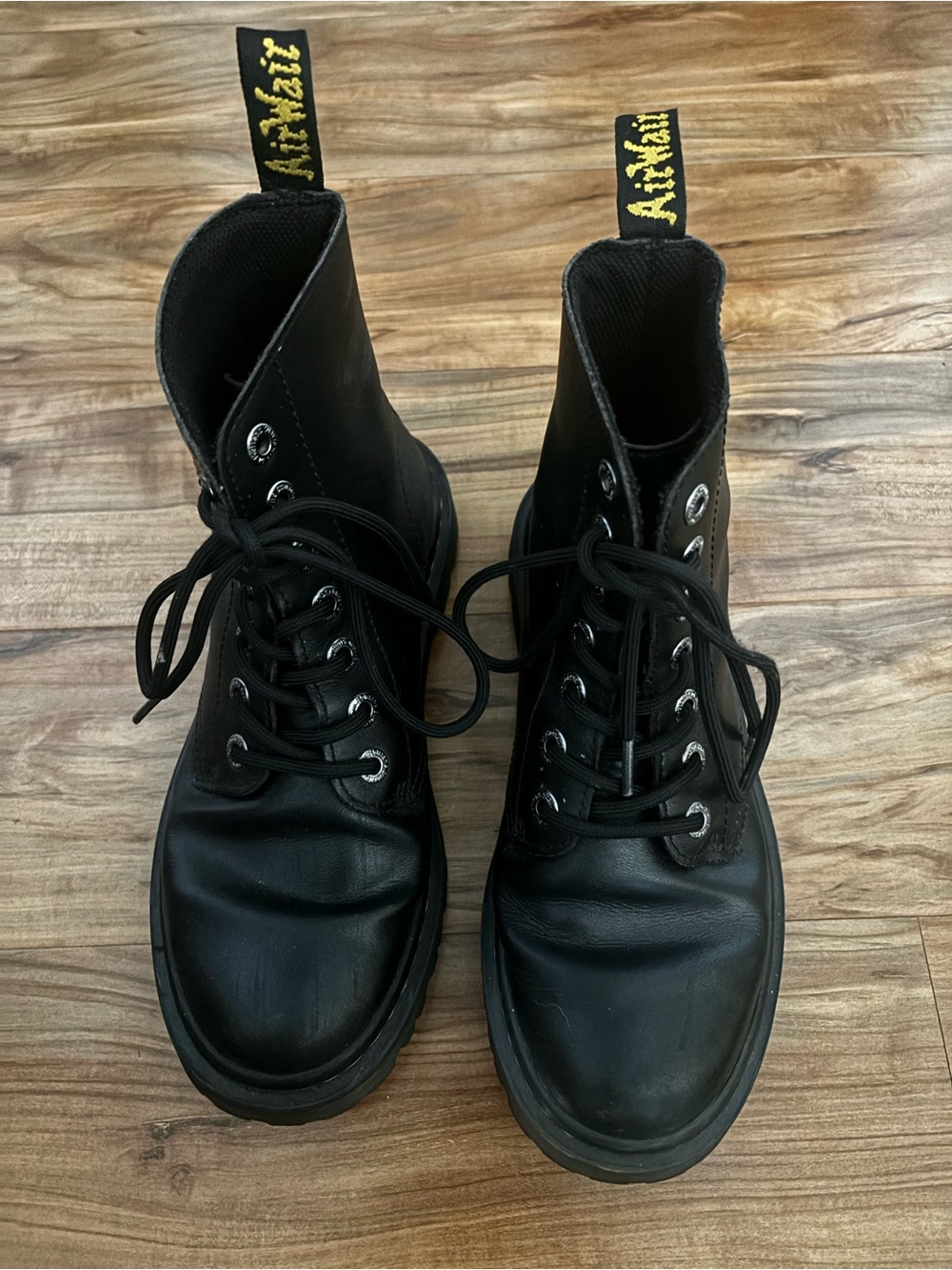 Dr. Martens Black Leather 8-Eye Combat Boots with Yellow Heel Loops